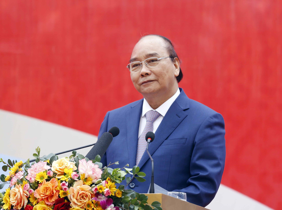 Chủ tịch nước Nguyễn Xuân Phúc phát biểu tại lễ phát động thi đua của Tập đoàn Dệt may Việt Nam. (Ảnh: Thống Nhất/TTXVN)