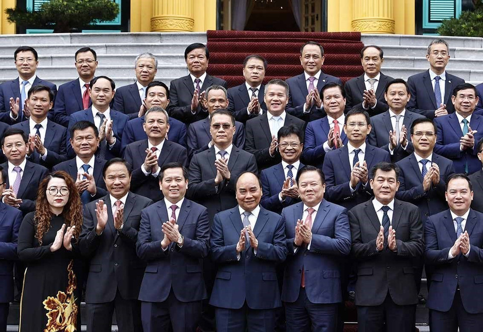 Chủ tịch nước Nguyễn Xuân Phúc với các đại biểu. (Ảnh: Thống Nhất/TTXVN)