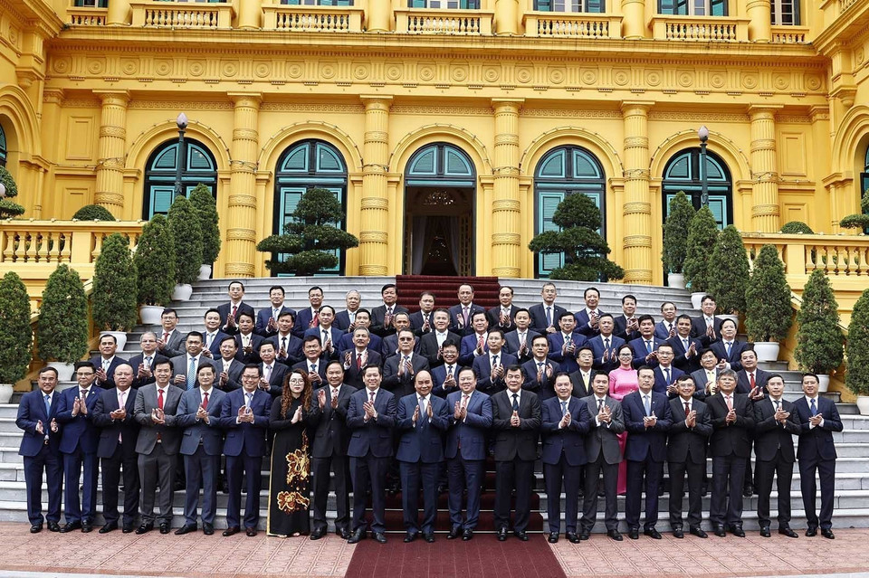 Chủ tịch nước Nguyễn Xuân Phúc với các đại biểu. (Ảnh: Thống Nhất/TTXVN)