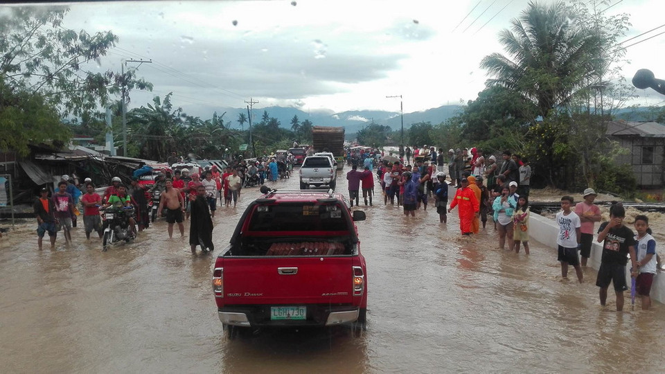 Cảnh ngập lụt sau khi bão Tembin quét qua thành phố Davao, Philippines, ngày 22/12. (Nguồn: THX/TTXVN)