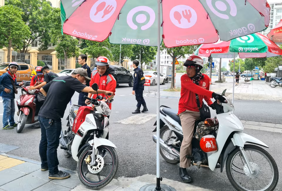 Với lực lượng tài xế đông đảo lên đến hàng chục nghìn người, văn phòng Hà Nội đã mất nhiều ngày để thiết kế quy trình và diễn tập trong suốt một tuần vừa qua để đảm bảo đối tác tài xế được phục vụ một cách thuận tiện và nhanh gọn nhất. (Ảnh: PV/Vietnam+)
