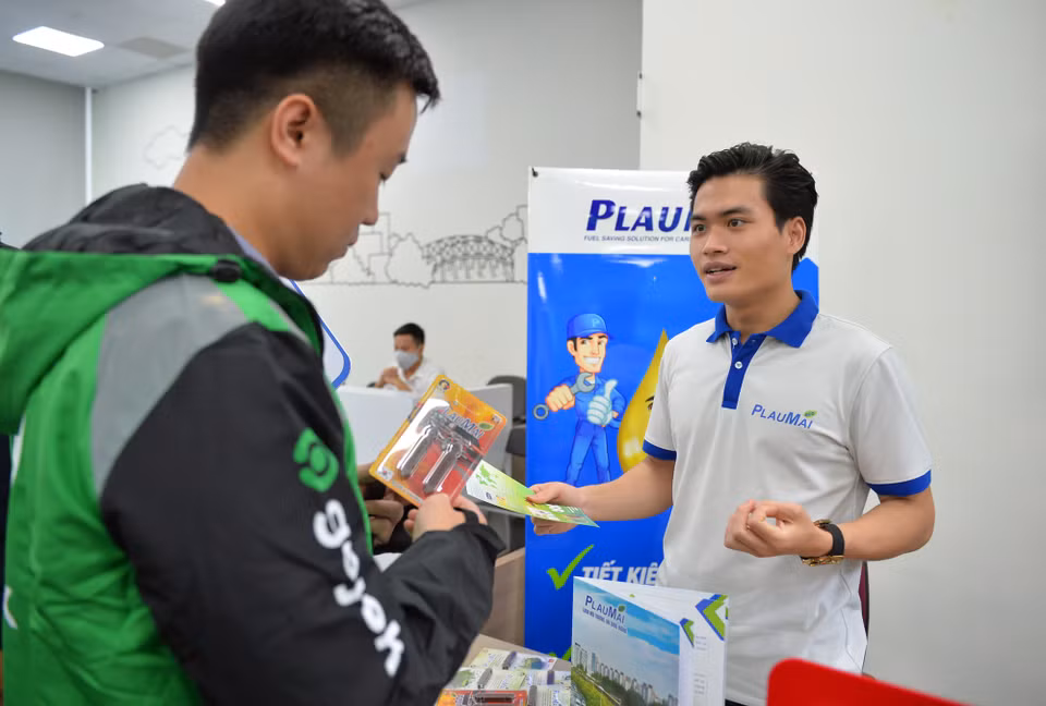 Hầu hết các đối tác tài xế đều tỏ ra hào hứng và hi vọng sự hợp tác lâu dài cùng Gojek. (Ảnh: PV/Vietnam+)