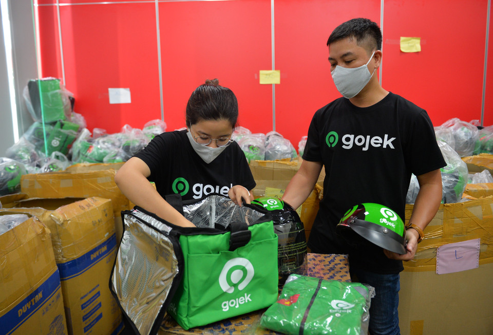 Đây là một trong những hoạt động nằm trong sự chuẩn bị hợp nhất từ GoViet thành Gojek để phục vụ tốt hơn cho khách hàng cũng như thuận lợi trong công việc của các đối tác tài xế. (Ảnh: PV/Vietnam+)