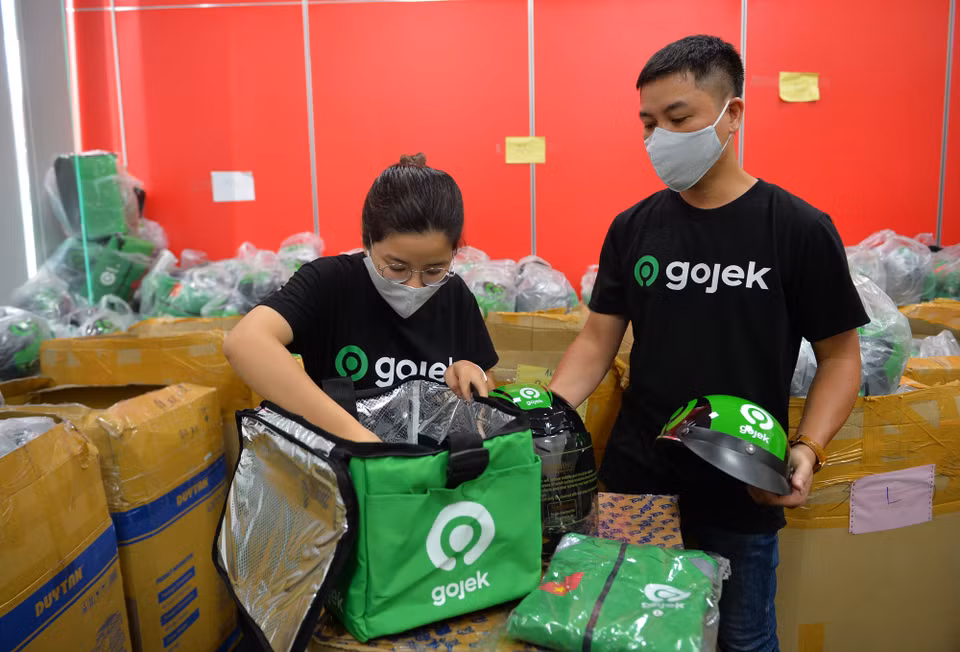 Đây là một trong những hoạt động nằm trong sự chuẩn bị hợp nhất từ GoViet thành Gojek để phục vụ tốt hơn cho khách hàng cũng như thuận lợi trong công việc của các đối tác tài xế. (Ảnh: PV/Vietnam+)