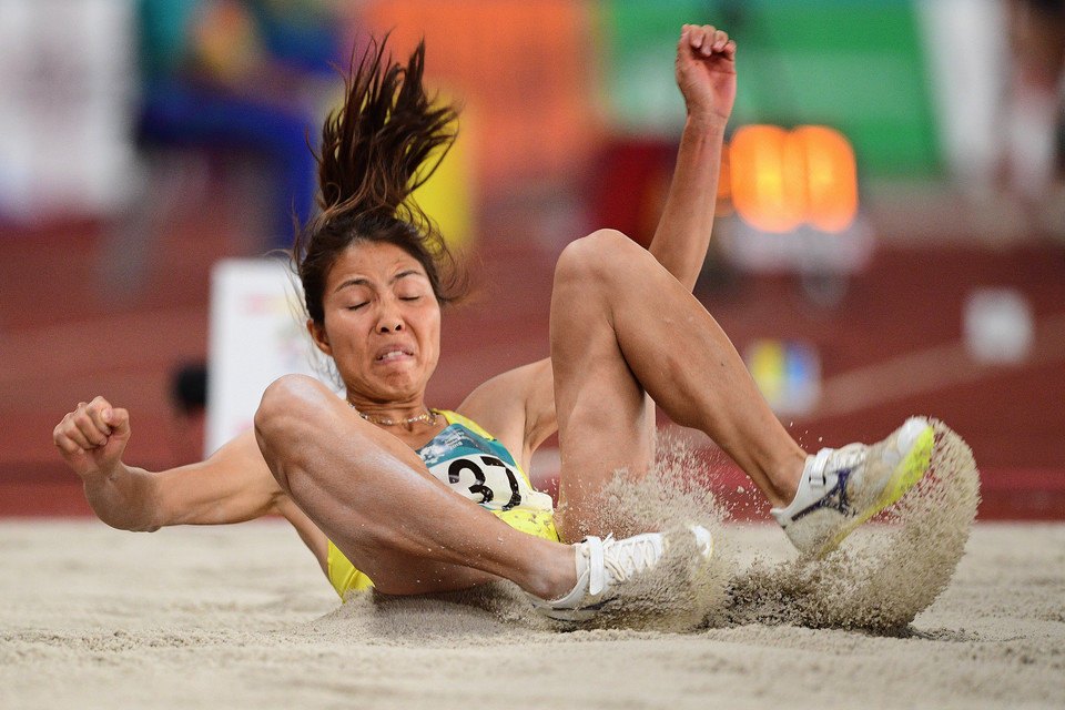 VĐV Bùi Thị Thu Thảo trong phần thi nhảy xa nữ tại ASIAD 2018, Jakarta, Indonesia ngày 27/8. (Ảnh: AFP/TTXVN)