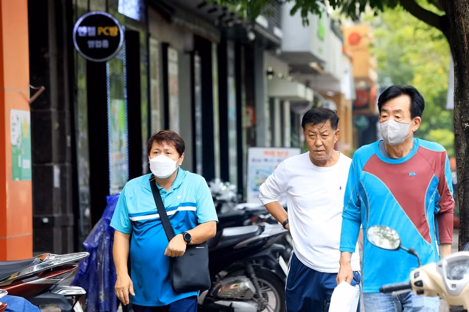 Dù chưa thực sự hòa nhập với cuộc sống ở Việt Nam nhưng đa số người Hàn đều khá hài lòng với cuộc sống của mình. (Ảnh: Tuấn Anh/TTXVN)