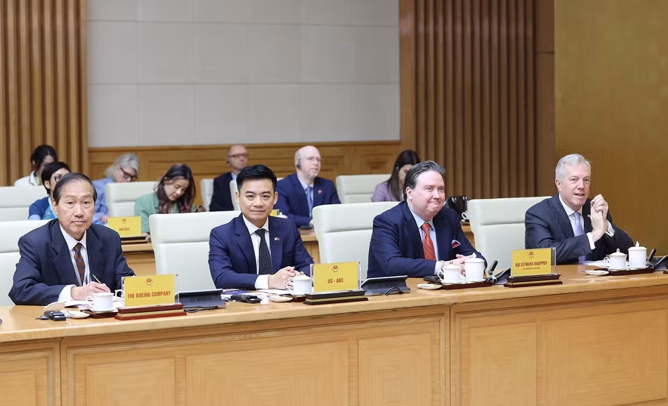 Các doanh nghiệp của Hội đồng Kinh doanh Hoa Kỳ - ASEAN tham dự buổi tiếp. (Ảnh: Dương Giang/TTXVN)