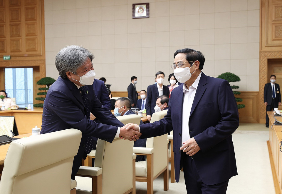 Thủ tướng Phạm Minh Chính với các đại biểu tham dự buổi gặp mặt. (Ảnh: Dương Giang/TTXVN)