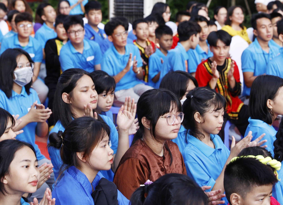 Học sinh trường tiểu học, THCS và THPT Hy Vọng tại Ngày hội tới trường. (Ảnh: Thống Nhất/TTXVN)
