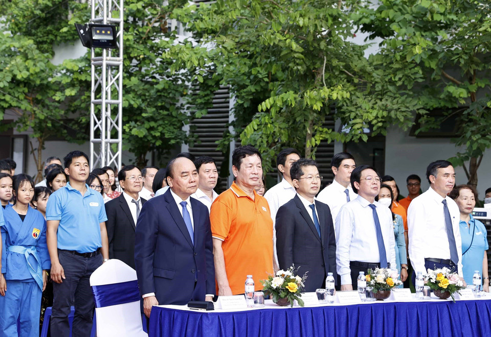 Chủ tịch nước Nguyễn Xuân Phúc dự Ngày hội tới trường tại trường tiểu học, THCS và THPT Hy Vọng. (Ảnh: Thống Nhất/TTXVN)