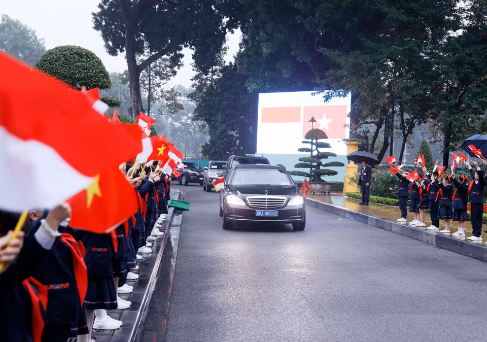 Lễ đón chính thức Tổng thống Cộng hòa Indonesia Joko Widodo thăm cấp Nhà nước tới Việt Nam. (Ảnh: Thống Nhất/TTXVN)