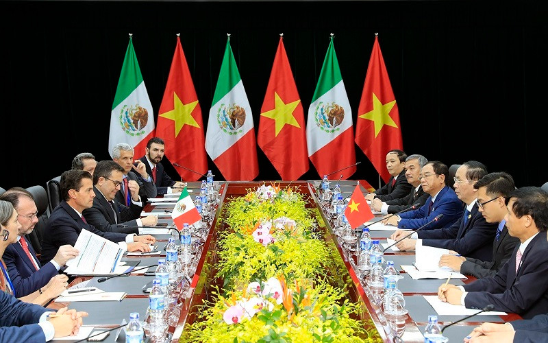 Chủ tịch nước Trần Đại Quang gặp song phương Tổng thống Mexico Enrique Peña Nieto. (Ảnh: TTXVN)