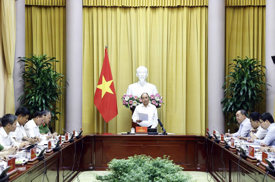 Chủ tịch nước Nguyễn Xuân Phúc, Trưởng Ban Chỉ đạo Cải cách Tư pháp Trung ương chủ trì buổi làm việc với Thường trực Hội đồng Tư vấn đặc xá và một số cơ quan liên quan, kiểm tra việc tổ chức thực hiện đặc xá theo Quyết định số 766 của Chủ tịch nước về đặc xá năm 2022. (Ảnh: Thống Nhất/TTXVN)