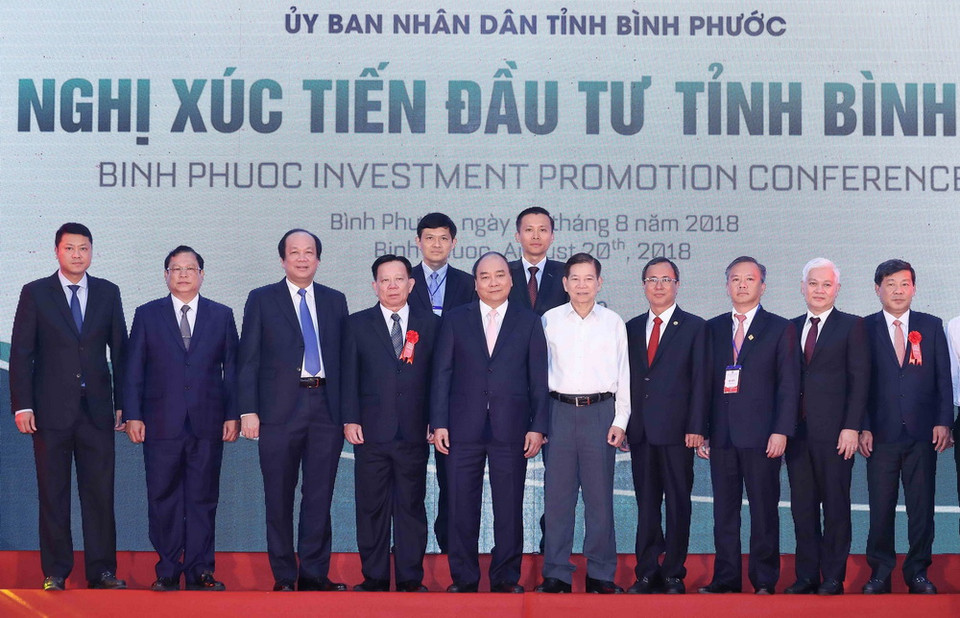 Thủ tướng Nguyễn Xuân Phúc chứng kiến lễ ký biên bản thỏa thuận phát triển dự án Khu liên hợp Becamex - Bình Phước. (Ảnh: Thống Nhất/TTXVN)