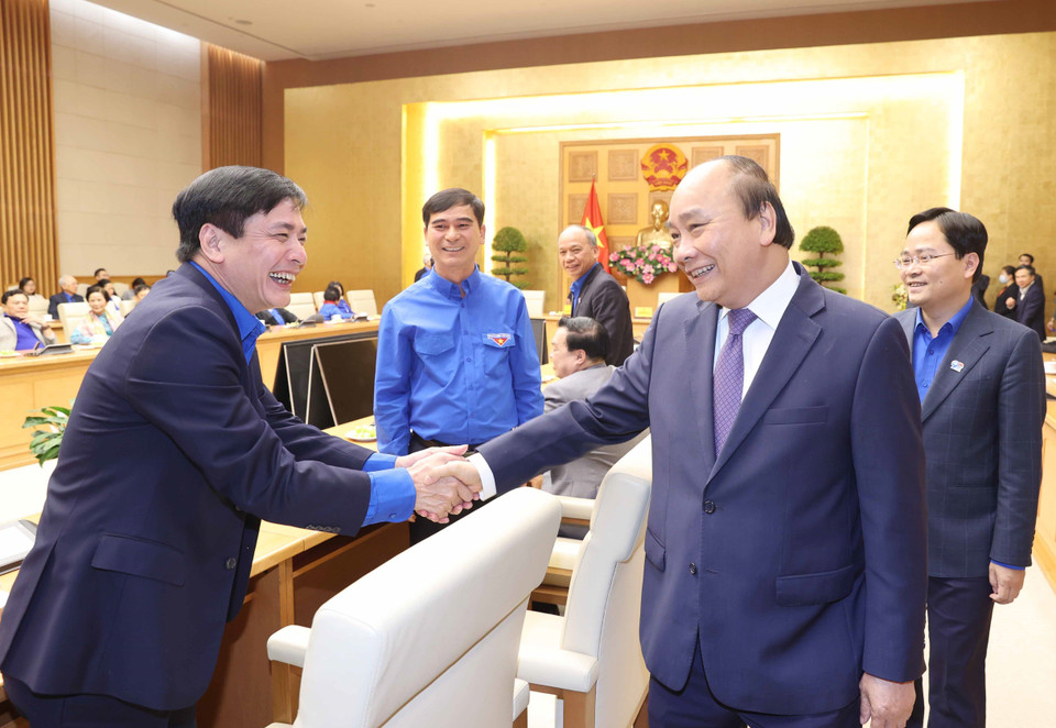 Thủ tướng Nguyễn Xuân Phúc với các đại biểu tại buổi gặp mặt. (Ảnh: Thống Nhất/TTXVN)