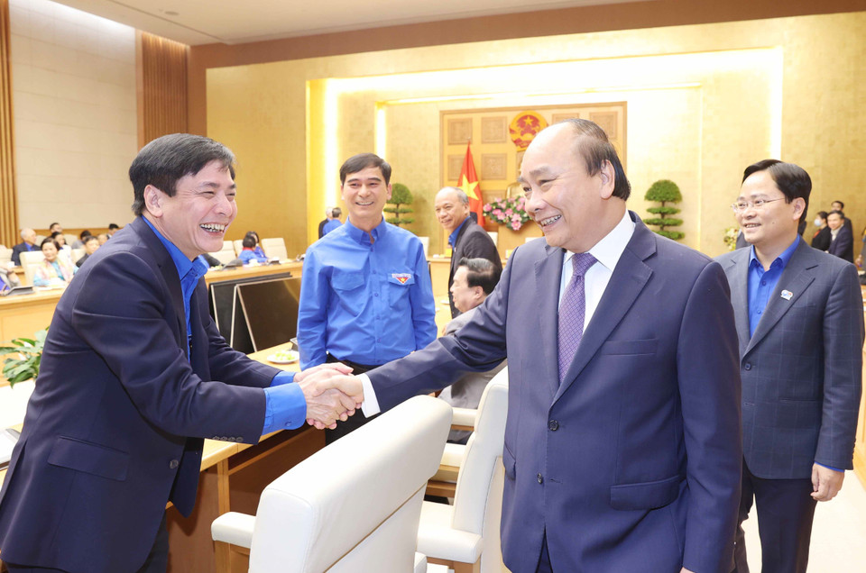 Thủ tướng Nguyễn Xuân Phúc với các đại biểu tại buổi gặp mặt. (Ảnh: Thống Nhất/TTXVN)