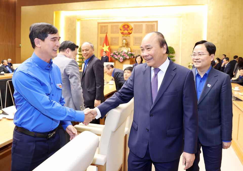 Thủ tướng Nguyễn Xuân Phúc với các đại biểu tại buổi gặp mặt. (Ảnh: Thống Nhất/TTXVN)