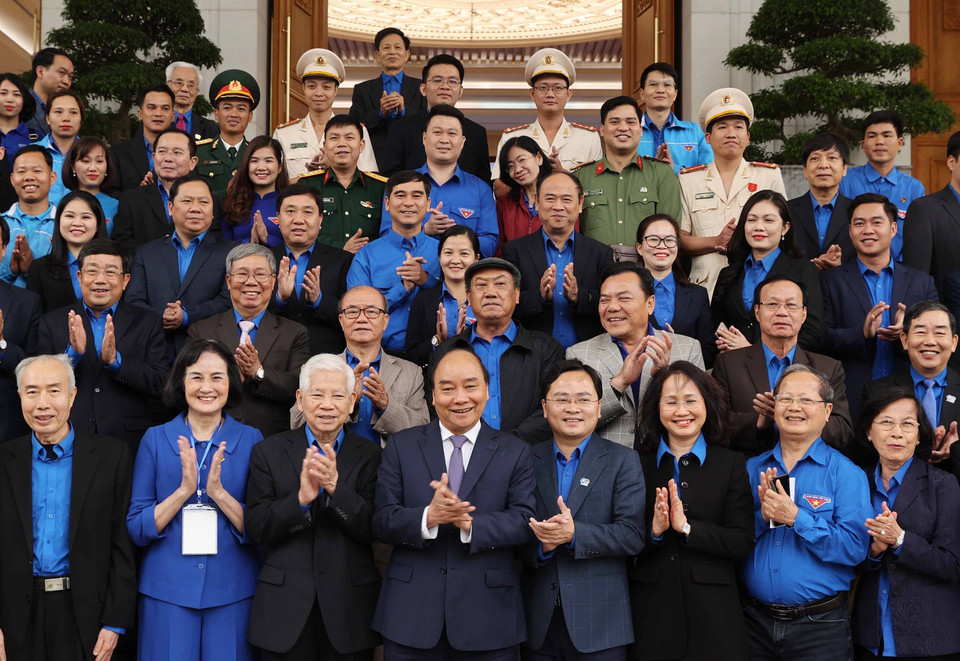 Thủ tướng Nguyễn Xuân Phúc với các đại biểu tại buổi gặp mặt. (Ảnh: Thống Nhất/TTXVN)