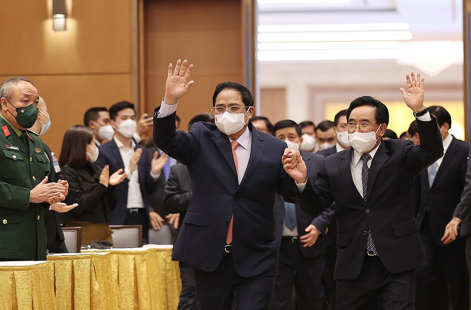 Thủ tướng Phạm Minh Chính và Thủ tướng Lào Phankham Viphavanh đến dự buổi gặp gỡ. (Ảnh: Dương Giang/TTXVN)