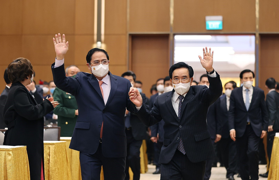 Hình ảnh Thủ tướng Phạm Minh Chính và Thủ tướng Lào Phankham Viphavanh đến dự buổi gặp gỡ. (Ảnh: Dương Giang/TTXVN)