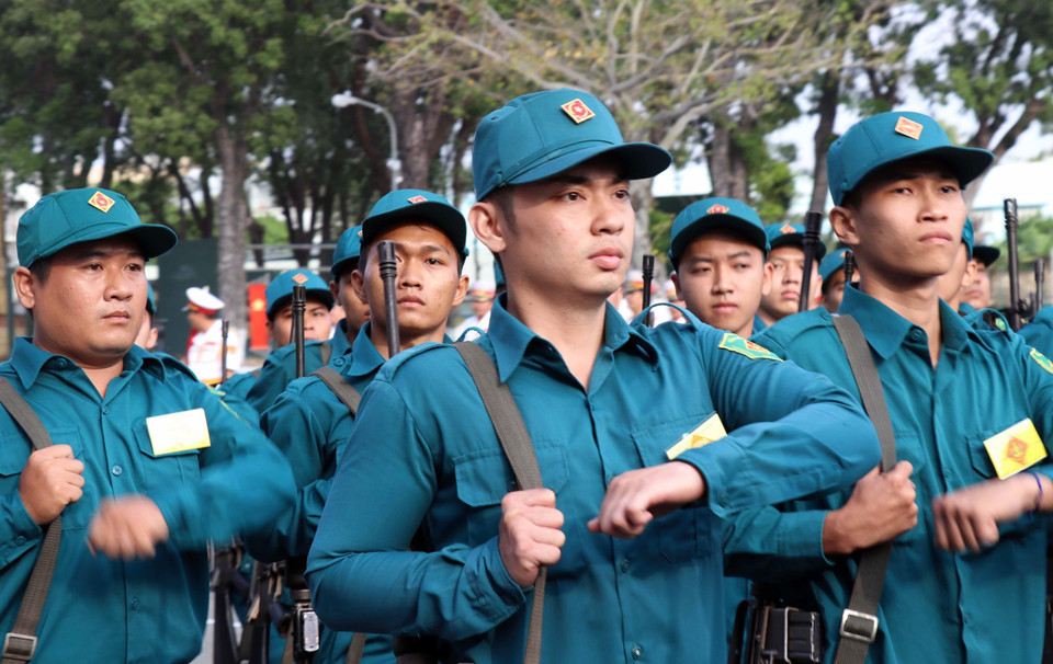  Các lực lượng vũ trang Thành phố Hồ Chí Minh duyệt đội ngũ tại Lễ ra quân huấn luyện năm 2019. (Ảnh: Xuân Khu/TTXVN)