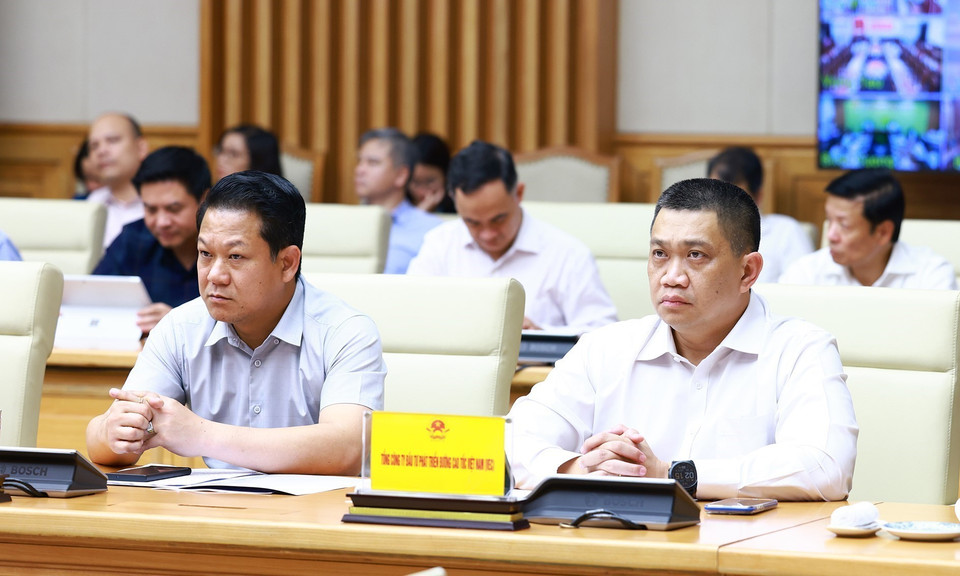 Đại diện các nhà thầu, đơn vị thi công tham dự phiên họp. (Ảnh: Dương Giang/TTXVN)