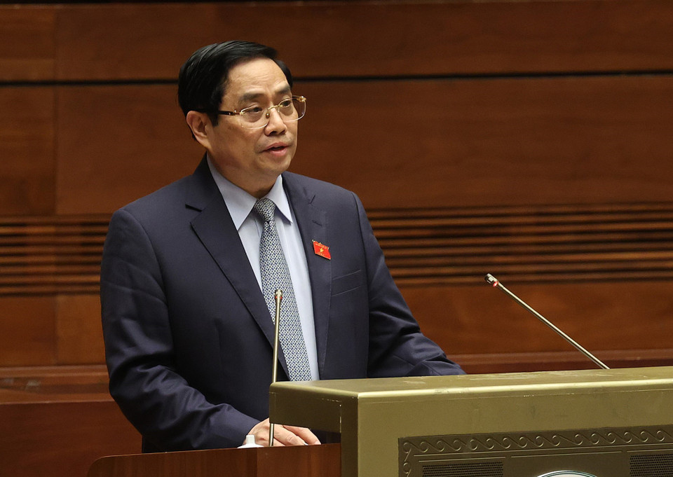 Thủ tướng Chính phủ nhiệm kỳ 2016-2021 Phạm Minh Chính trình bày Báo cáo giải trình, tiếp thu ý kiến của đại biểu Quốc hội về cơ cấu tổ chức của Chính phủ nhiệm kỳ 2021-2026. (Ảnh: Dương Giang/TTXVN)