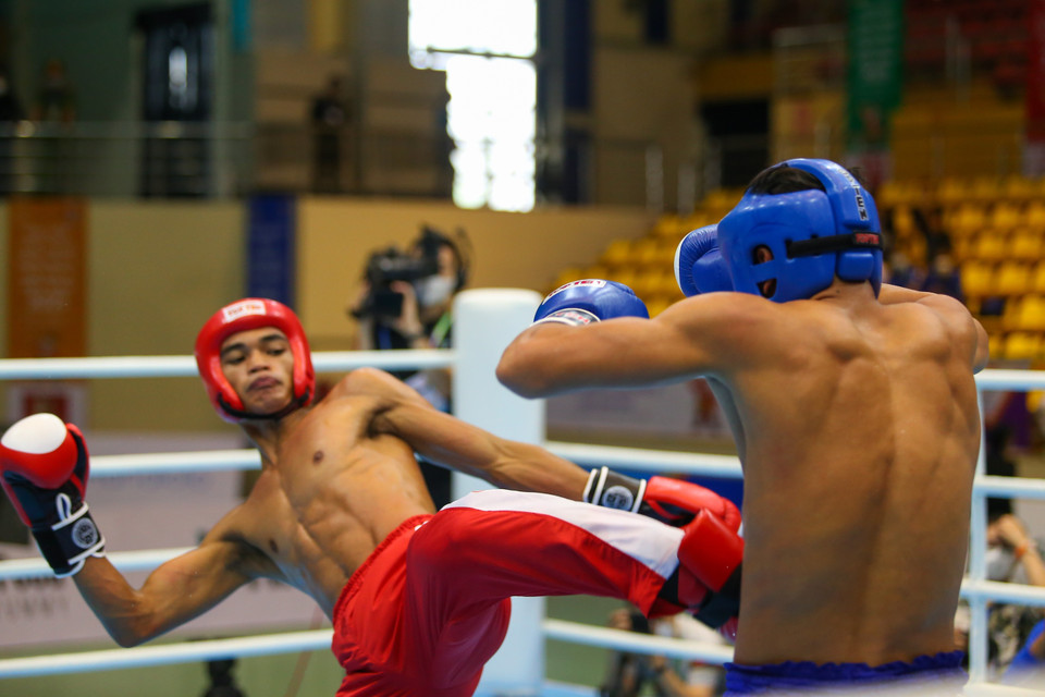 Vận động viên Toch Rachhan (Campuchia) giành chiến thắng trước Esteban Jomar Balangui (Philippines). (Ảnh: Khánh Hòa/TTXVN)