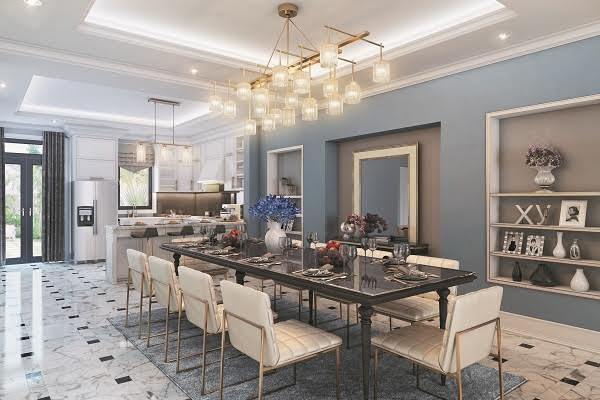 Kế đến là phòng ăn và bếp luôn có cảm giác ấm cúng với ánh đèn vàng tỏa khắp không gian.