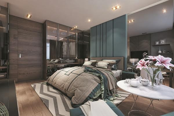 Phòng ngủ tiêu chuẩn sẽ hoàn hảo hơn với điểm nhấn là một lọ hoa giàu sức sống trên bàn nước nhỏ cạnh cửa kính lớn. Màu sắc giữa các mảng tường ''ton-sur-ton'' với chăn, gối, ghế sofa tạo nên điểm nhấn duyên dáng cho không gian nghỉ ngơi riêng tư này.