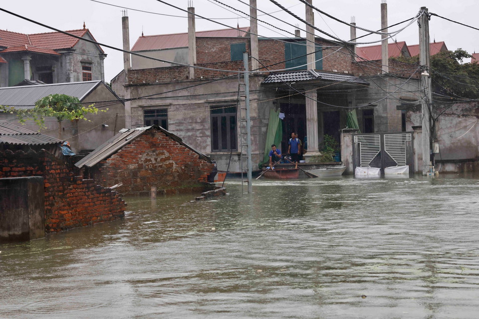 Quang cảnh ngập lụt tại Thôn Nhân Lý, xã Nam Phương Tiến, huyện Chương Mỹ. (Ảnh: Doãn Tấn/TTXVN)