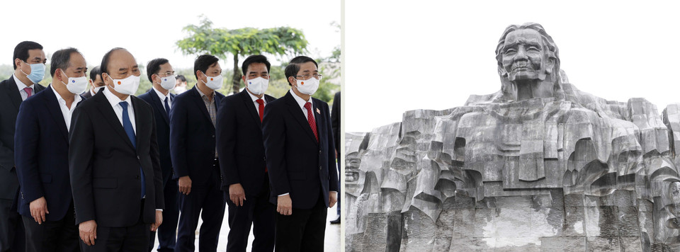 Chủ tịch nước Nguyễn Xuân Phúc dâng hương, hoa tại Tượng đài Bà mẹ Việt Nam anh hùng. (Ảnh: Thống Nhất/TTXVN)