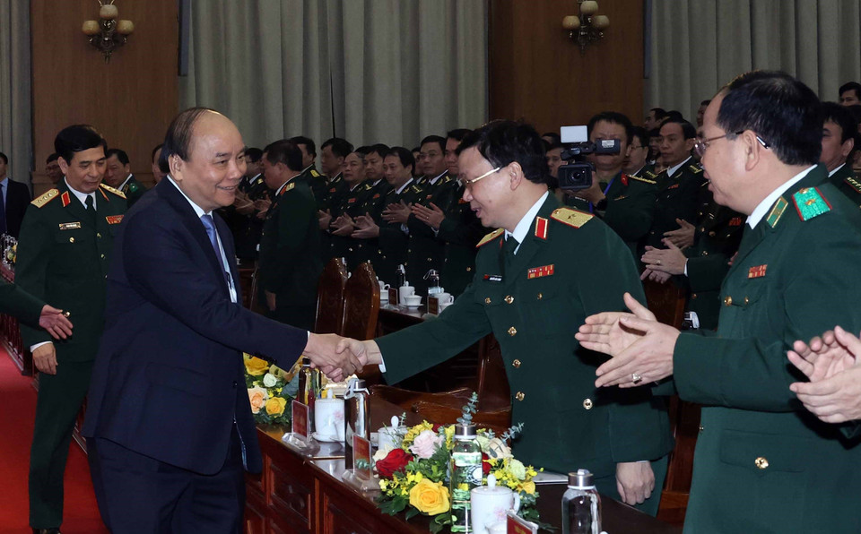 Thủ tướng Nguyễn Xuân Phúc với đại biểu. (Ảnh: Thống Nhất/TTXVN)