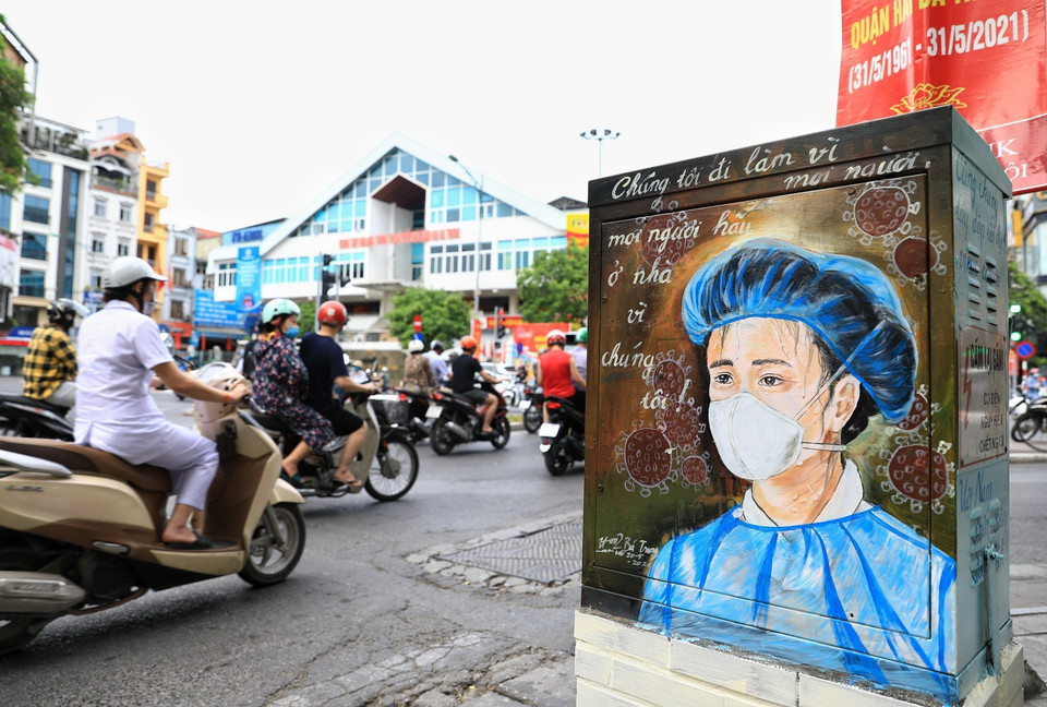 Hình họa các bác sỹ, lực lượng y tế ở tuyến đầu chống dịch, kêu gọi người dân ở nhà khi có dịch bệnh. (Ảnh: Thành Đạt/TTXVN)