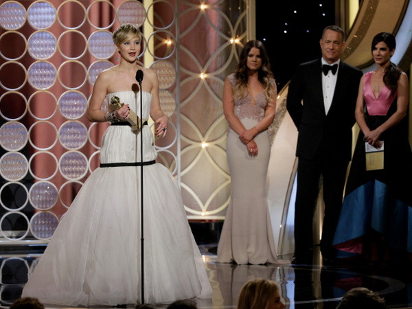 Jennifer Lawrence giành giải Quả cầu Vàng ở hạng mục nữ diễn viên phụ xuất sắc nhất nhờ vai diễn trong American Hustle. (Nguồn: Getty Images)