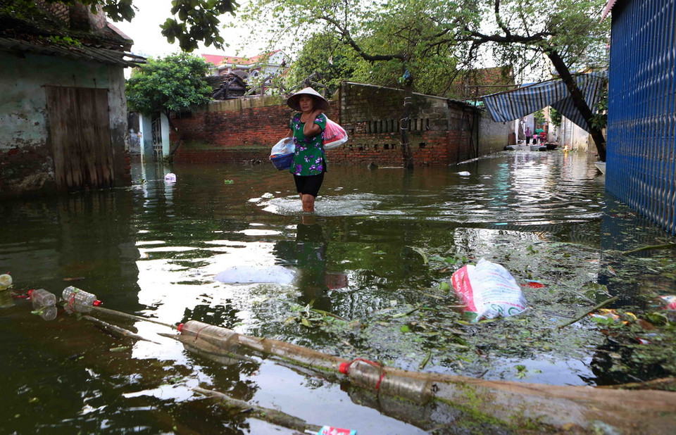 Trong đợt mưa vừa rồi, mực nước đỉnh điểm đo được tại huyện Chương Mỹ là 7,51m vào ngày 30/7. (Ảnh: Thành Đạt/TTXVN)