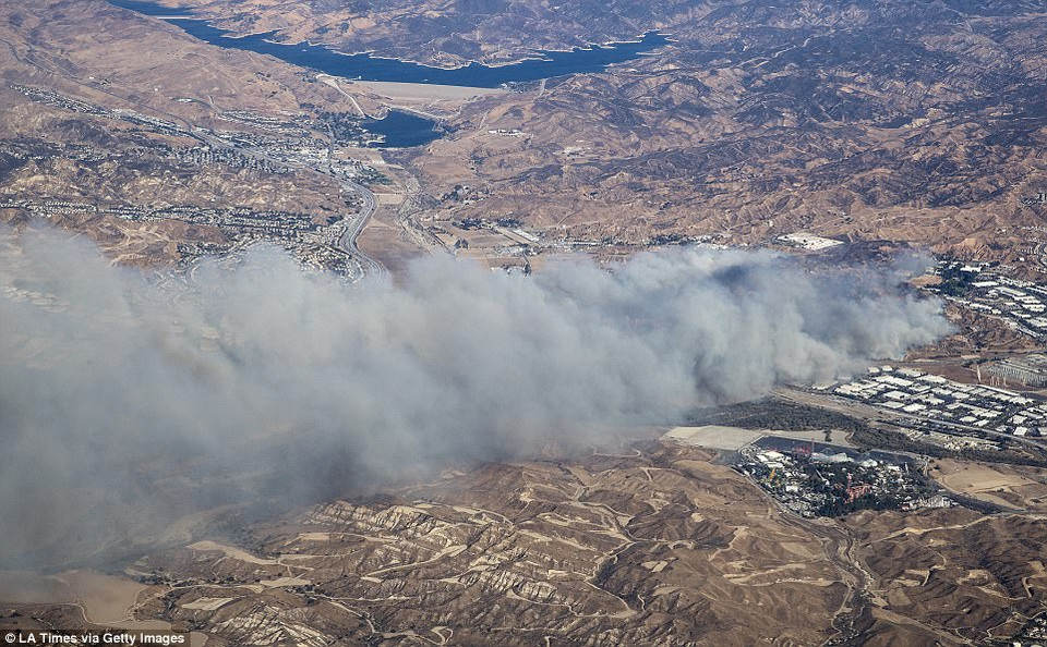 Hàng chục ngôi nhà bị thiêu trụi. (Nguồn: Getty)