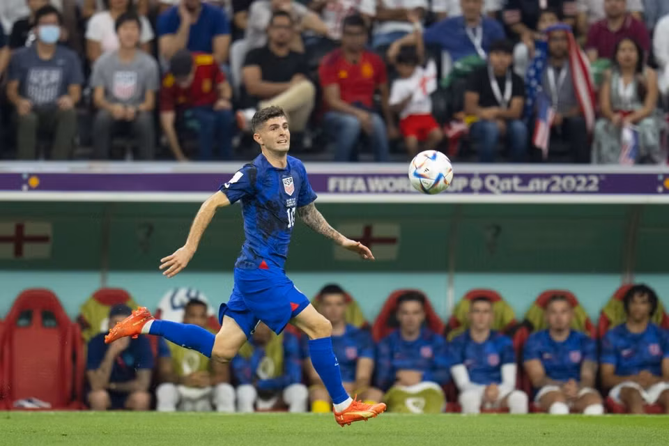 Tuyển Mỹ giành vé đi tiếp nhờ sự tỏa sáng của Christian Pulisic với bàn thắng quyết định vào lưới Iran ở lượt cuối bảng B. (Nguồn: Getty Images)