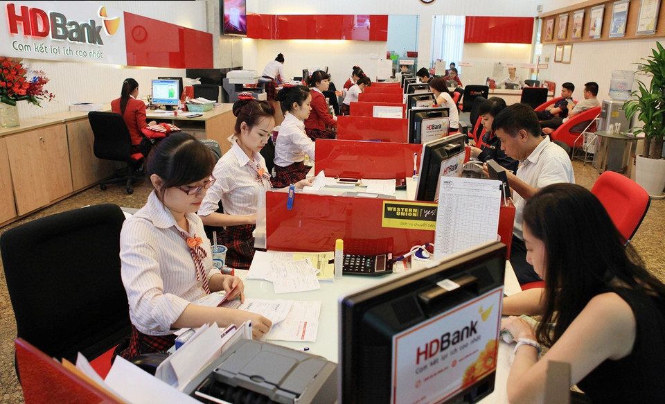 Ngân hàng Thương mại cổ phần Phát triển Thành phố Hồ Chí Minh (HDBank) cung ứng nguồn vốn vay cho các thành phần tham gia sản xuất, kinh doanh lúa gạo là hộ nông dân, doanh nghiệp kinh doanh lúa gạo thực hiện phương án liên kết Cánh đồng lớn khu vực Đồng bằng sông Cửu Long. (Ảnh: Trần Việt/TTXVN)