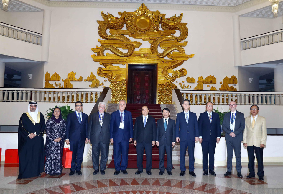 Thủ tướng Nguyễn Xuân Phúc và các Trưởng đoàn tại buổi tiếp. (Ảnh: Thống Nhất/TTXVN)