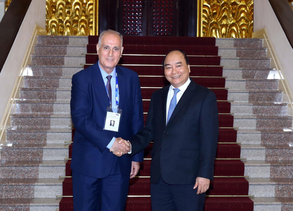 Thủ tướng Nguyễn Xuân Phúc và Ngài Aslan Aslannov, Chủ tịch OANA, Tổng giám đốc hãng Thông tấn AZERTAC (Azerbaijan) tại buổi tiếp. (Ảnh: Thống Nhất/TTXVN)