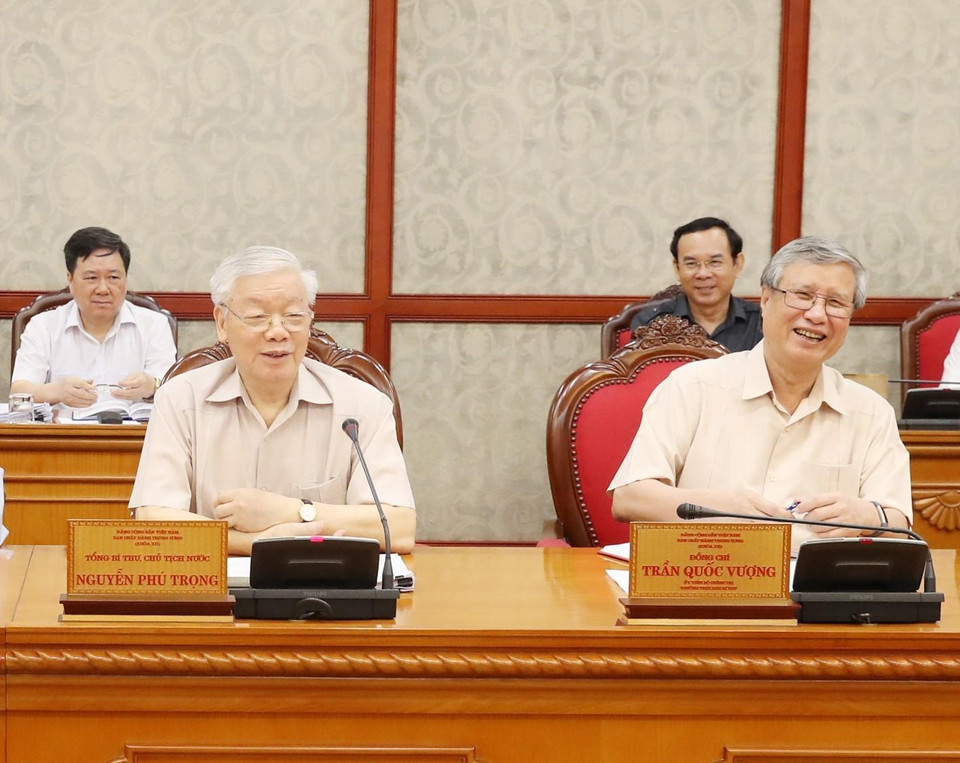 Tổng Bí thư, Chủ tịch nước Nguyễn Phú Trọng và Ủy viên Bộ Chính trị, Thường trực Ban Bí thư Trần Quốc Vượng tại cuộc họp. (Ảnh: Trí Dũng/TTXVN)