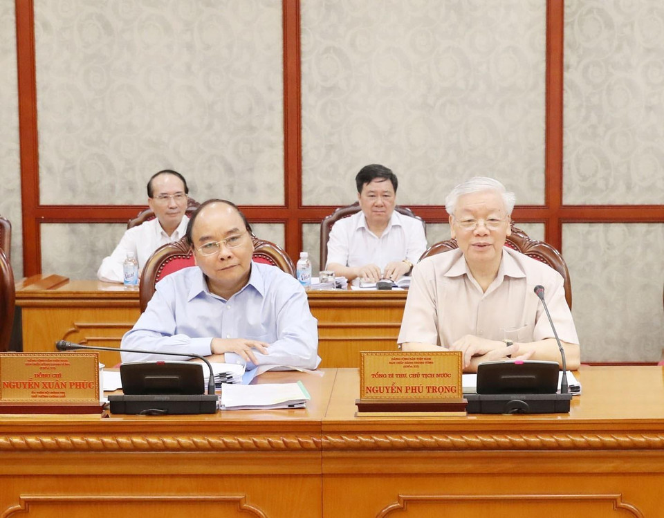 Tổng Bí thư, Chủ tịch nước Nguyễn Phú Trọng và Thủ tướng Nguyễn Xuân Phúc tại cuộc họp.(Ảnh: Trí Dũng/TTXVN)