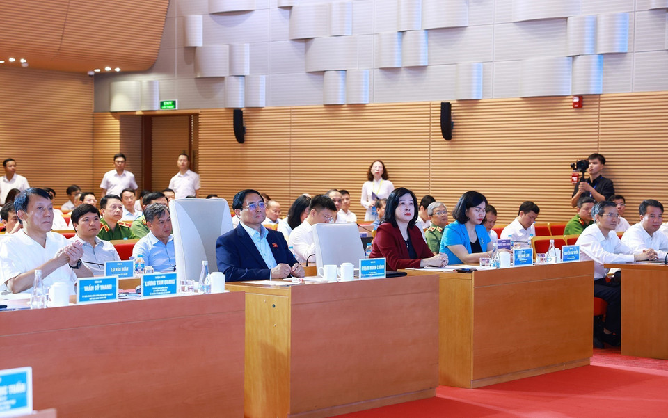 Thủ tướng Phạm Minh Chính dự Hội nghị sơ kết 6 tháng thực hiện Đề án 06 của thành phố Hà Nội. (Ảnh: Dương Giang/TTXVN)
