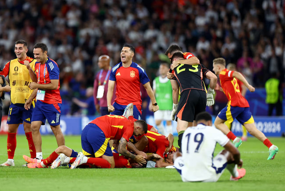 Niềm vui của các cầu thủ Tây Ban Nha. (Nguồn: Getty Images)