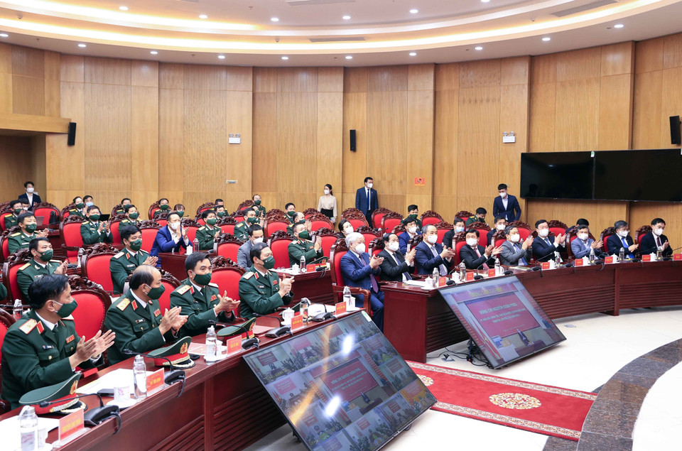 Các đại biểu tham dự buổi làm việc của Chủ tịch nước Nguyễn Xuân Phúc với Quân khu 4. (Ảnh: Thống Nhất/TTXVN)