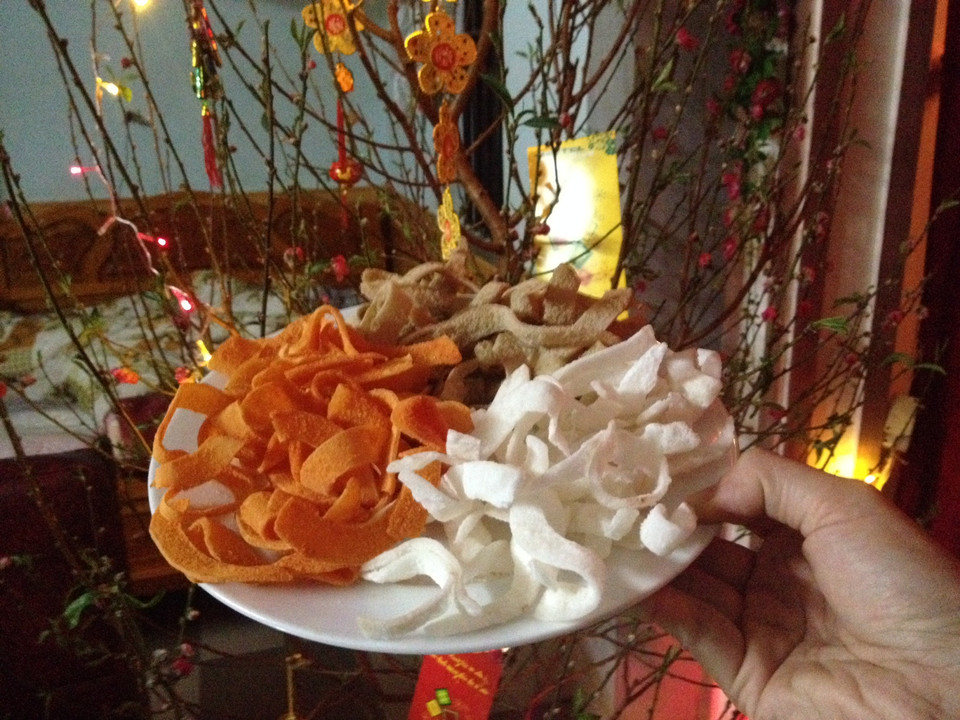 Đĩa mứt mời khách dịp năm mới. (Ảnh: Mai Huyền/Vietnam+)