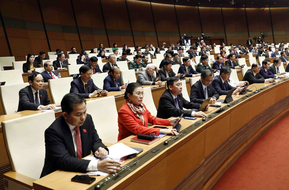 Các đại biểu Quốc hội biểu quyết thông qua Nghị quyết về Quy hoạch tổng thể quốc gia thời kỳ 2021-2030, tầm nhìn 2050. (Ảnh: An Đăng/TTXVN)