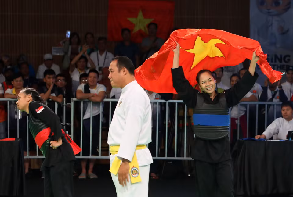 Phạm Thị Tươi vui mừng sau khi kết thúc thắng lợi trận đấu. (Ảnh: Quốc Khánh/TTXVN)