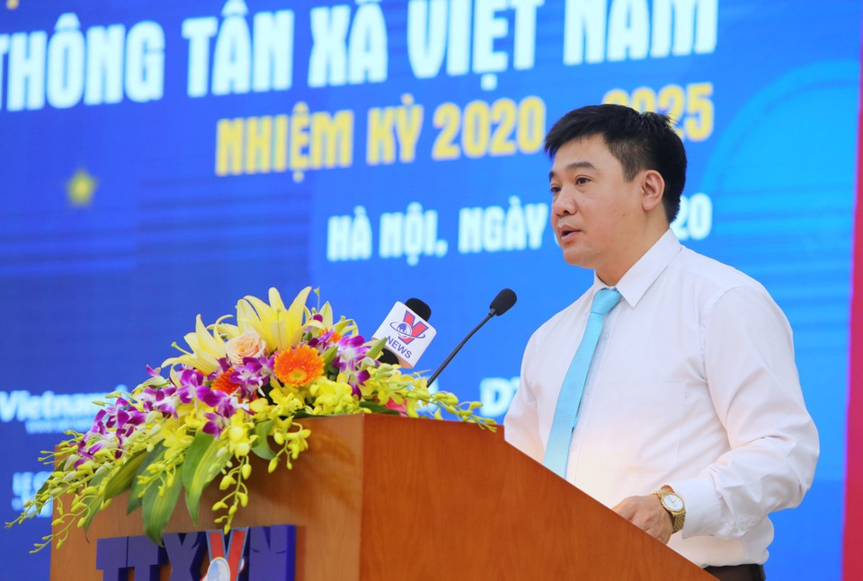 Ông Đàm Danh Liêm, Phó Trưởng ban Tổ chức cán bộ đọc báo cáo thẩm tra tư cách Đại biểu và quy chế làm việc của Đại hội. Ảnh: Thành Đạt/TTXVN)